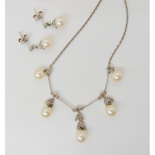 2814 - NECKLET WITH MATCHING EARRINGSthe pearl and diamond necklet with five twin leaf pattern drops set wi... 