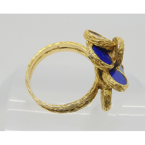 2817 - A RETRO LAPIS LAZULI RINGthe bark textures ring has flat planes of lapis lazuli set win a flower for... 