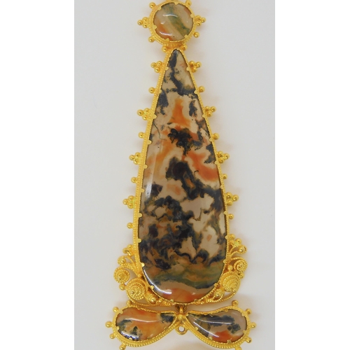 2822 - A MOSS AGATE FILLIGREE PENDANTthe fine hand cut cabochons are a good mix of green orange and clear a... 