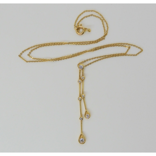 2825 - AN 18CT GOLD RAINDROP PENDANTset with estimated approx 0.20cts of brilliant cut diamonds on a fine 1... 