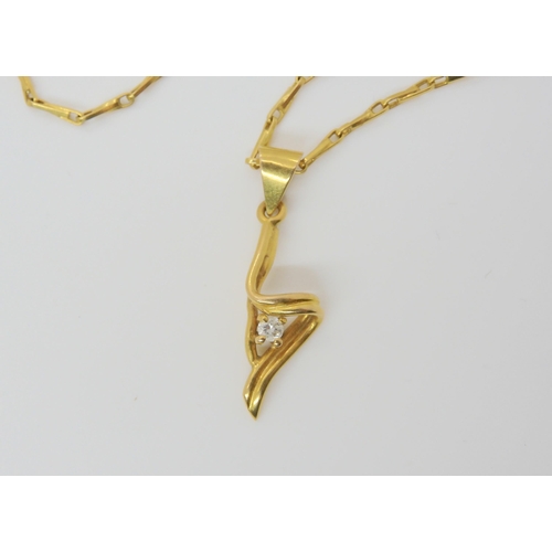 2829 - A DIAMOND PENDANT AND CHAINwith an 18k gold wheat seed chain, length 49cm, with hook clasp. The pend... 