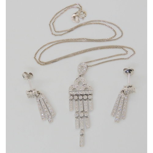 2831 - DIAMOND PENDANT AND EARRINGSthe pendant of Art Deco form is set throughout with brilliant cut diamon... 