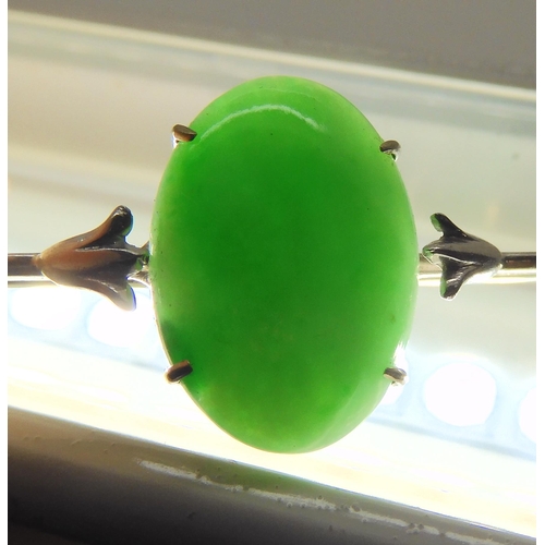 2832 - A CHINESE GREEN HARDSTONE BROOCHthe green hardstone measures approx 15.7mm x 11mm x 4.5mm, length 6.... 