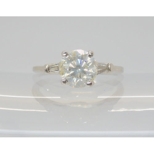 2833 - A DIAMOND SOLITAIRE RINGthe classic diamond solitaire, is estimated approx 1.98cts, with further bag... 