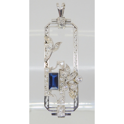 2835 - AN ART DECO DIAMOND & SAPPHIRE PENDANTset throughout in 18ct white gold and platinum with floral... 