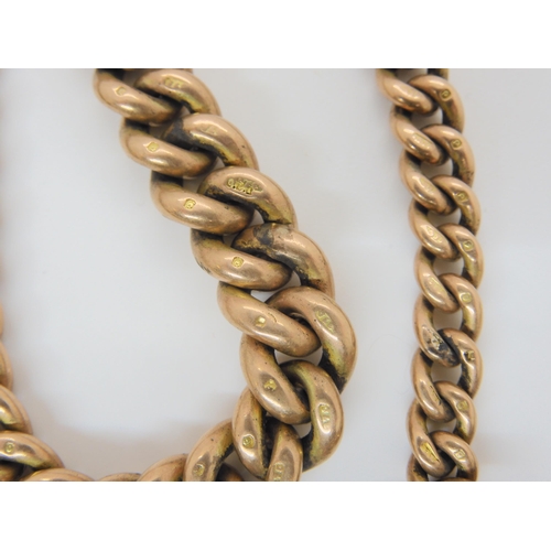 2857 - A 9CT ROSE GOLD ALBERT CHAINthe tapered fob chain is stamped .375 9ct to every link, 'T' bar and lob... 