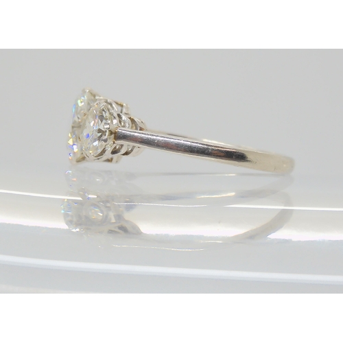 2861 - A SUBSTANTIAL DIAMOND THREE STONE RINGmounted throughout in platinum, with a really pretty setting. ... 