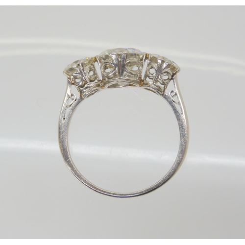 2861 - A SUBSTANTIAL DIAMOND THREE STONE RINGmounted throughout in platinum, with a really pretty setting. ... 