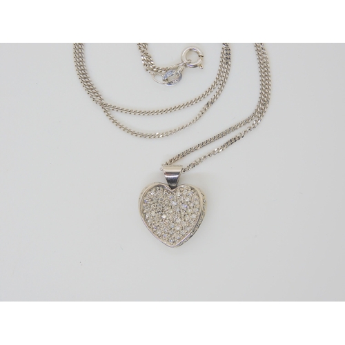 2862 - A 9CT GOLD DIAMOND HEART PENDANTset with estimated approx 0.40cts of pave set diamonds,dimensions 1.... 