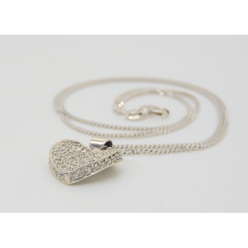 2862 - A 9CT GOLD DIAMOND HEART PENDANTset with estimated approx 0.40cts of pave set diamonds,dimensions 1.... 