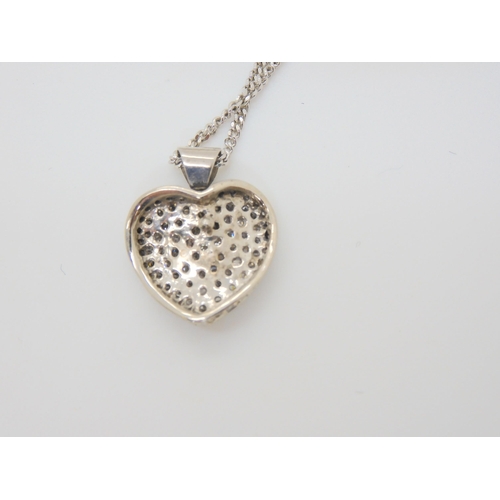 2862 - A 9CT GOLD DIAMOND HEART PENDANTset with estimated approx 0.40cts of pave set diamonds,dimensions 1.... 