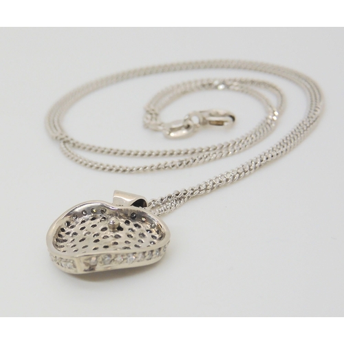 2862 - A 9CT GOLD DIAMOND HEART PENDANTset with estimated approx 0.40cts of pave set diamonds,dimensions 1.... 