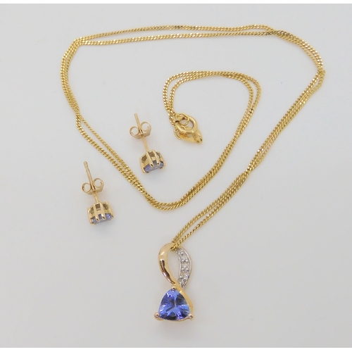 2863 - AN 9CT GOLD TRILLIANT CUT TANZANITE SUITEthe pendant set in 9ct yellow gold with diamond accents, le... 