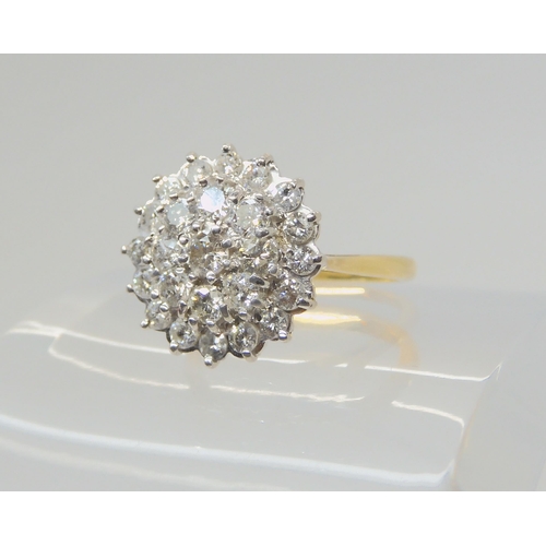 2870 - A SUBSTANTIAL DIAMOND CLUSTER RINGset with estimated approx 1ct of brilliant cut diamonds, finger si... 