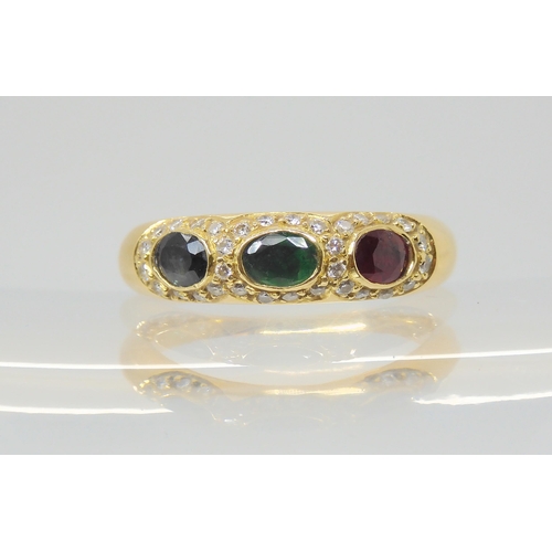 2881 - AN 18CT GOLD MIXED GEM RINGset with sapphire, ruby and emerald with halos of diamonds, finger size S... 