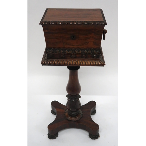 2069 - A VICTORIAN ROSEWOOD TEAPOYwith sarcophagus moulded hinged top caddy on turned pedestal on quatrefoi... 