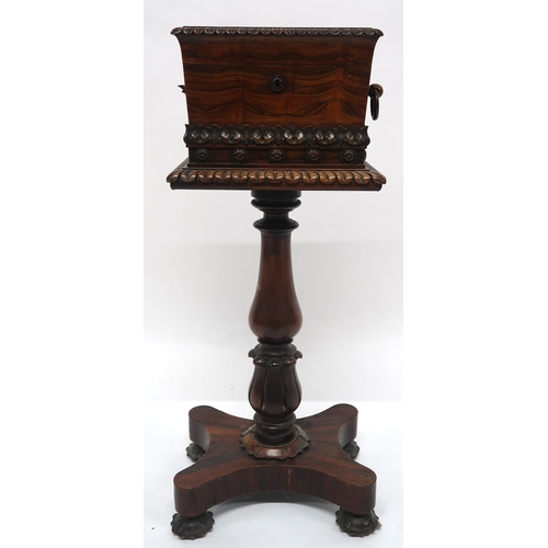 2069 - A VICTORIAN ROSEWOOD TEAPOYwith sarcophagus moulded hinged top caddy on turned pedestal on quatrefoi... 