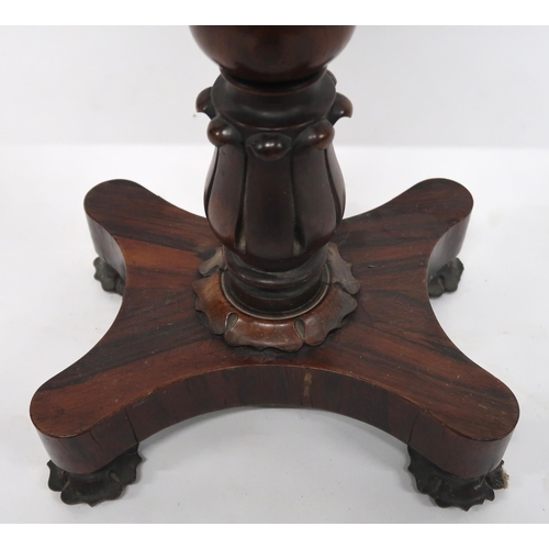 2069 - A VICTORIAN ROSEWOOD TEAPOYwith sarcophagus moulded hinged top caddy on turned pedestal on quatrefoi... 