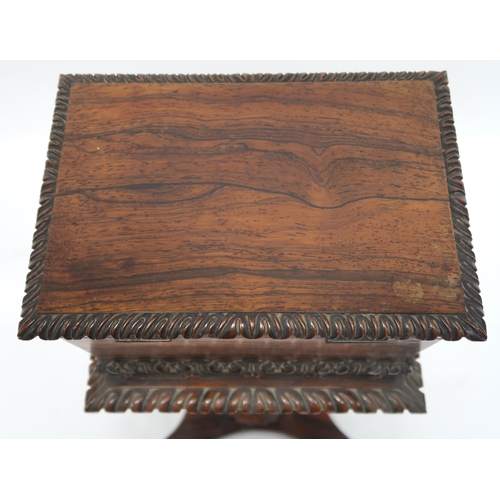 2069 - A VICTORIAN ROSEWOOD TEAPOYwith sarcophagus moulded hinged top caddy on turned pedestal on quatrefoi... 