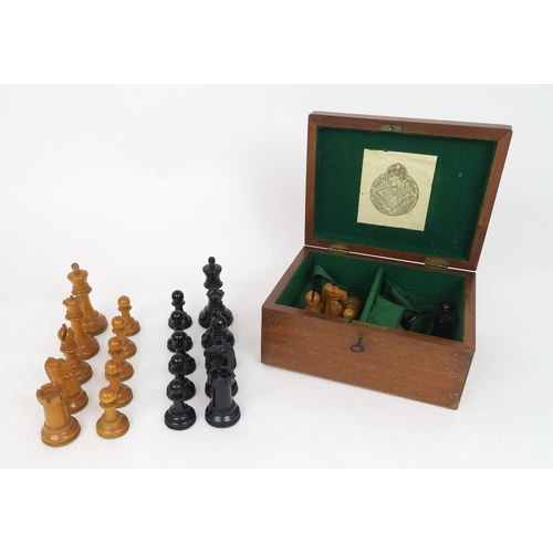 2593 - A JAQUES & SONS, LONDON STAUNTON PATTERN BOXWOOD AND EBONY CHESS SETIn mahogany box, lined in gr... 