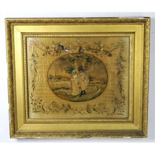 2597A - TWO REGENCY SILKWORK PANELSIn heavy gilt and gesso frames, one depicting a courting couple in a past... 