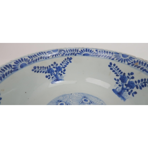 2427 - A CHINESE BLUE AND WHITE BOWL Painted with fish and aquatic foliage, four character reign marks, 23.... 