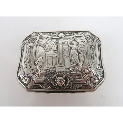 2498 - A GEORGE II SILVER SNUFF BOXof cartouche form, the hinged lid chased with a classical scene of a sta... 