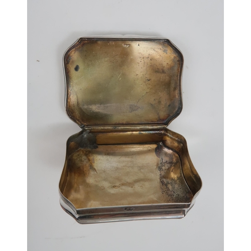 2498 - A GEORGE II SILVER SNUFF BOXof cartouche form, the hinged lid chased with a classical scene of a sta... 