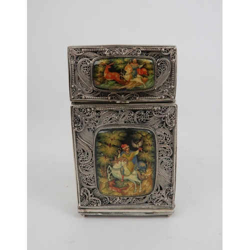 2503 - A RUSSIAN SILVER AND PAPIER-MÂCHÉ CIGARETTE CASEof rectangular form, the body of fine filigree work,... 