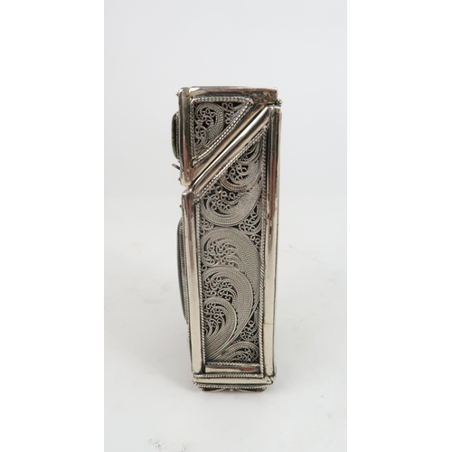 2503 - A RUSSIAN SILVER AND PAPIER-MÂCHÉ CIGARETTE CASEof rectangular form, the body of fine filigree work,... 