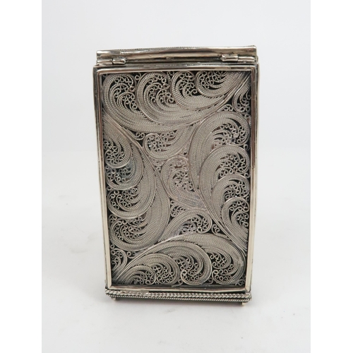 2503 - A RUSSIAN SILVER AND PAPIER-MÂCHÉ CIGARETTE CASEof rectangular form, the body of fine filigree work,... 