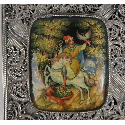 2503 - A RUSSIAN SILVER AND PAPIER-MÂCHÉ CIGARETTE CASEof rectangular form, the body of fine filigree work,... 