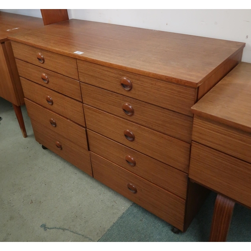 100 - A mid 20th century teak Schreiber bank of ten drawers, 71cm high x 100cm wide x 44cm deep