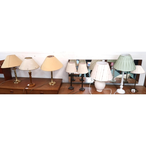 103 - A pair of brass based table lamps, pair of metal based table lamps and four assorted table lamps (8)