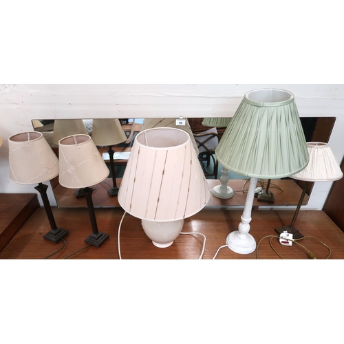 103 - A pair of brass based table lamps, pair of metal based table lamps and four assorted table lamps (8)