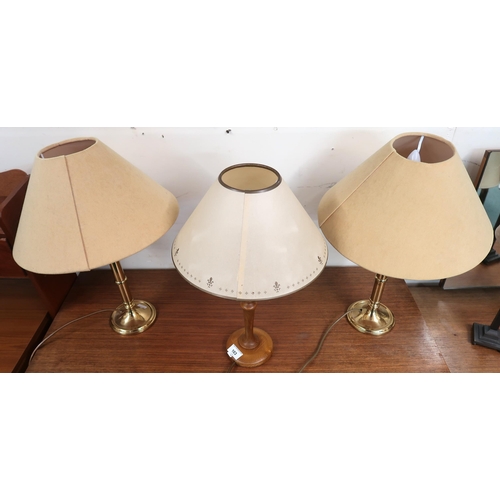 103 - A pair of brass based table lamps, pair of metal based table lamps and four assorted table lamps (8)