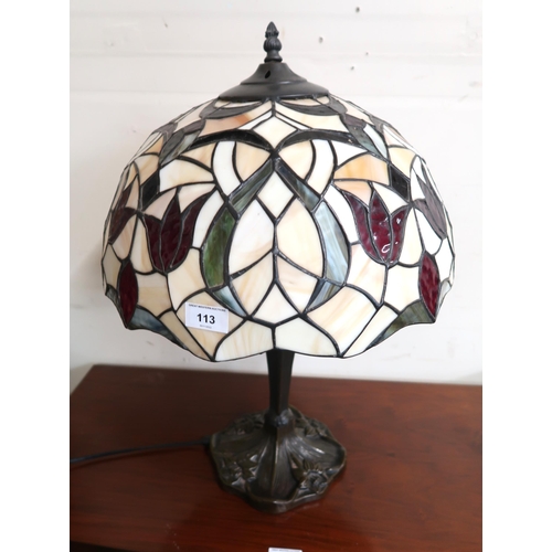 113 - A 20th century cast metal based table lamp with Tiffany style leaded stained glass shade, 53cm high ... 