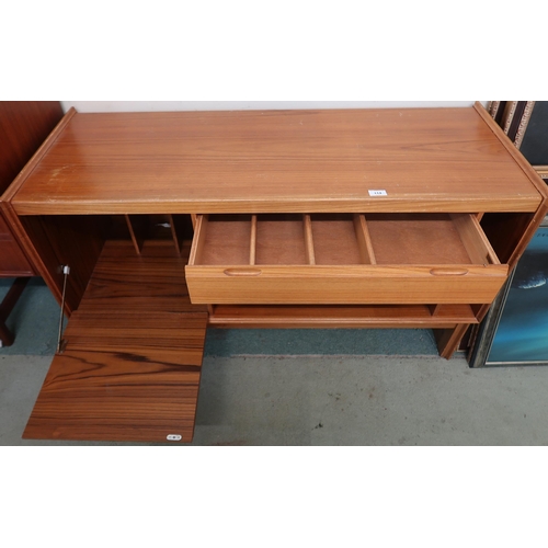 114 - A mid 20th century teak Turnidge stereo cabinet, 66cm high x 122cm wide x 48cm deep