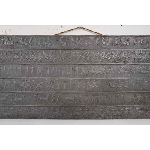 115 - A 20th century embossed lead panel decorated in the manner of the Elgin marbles, 34cm high x 132cm w... 