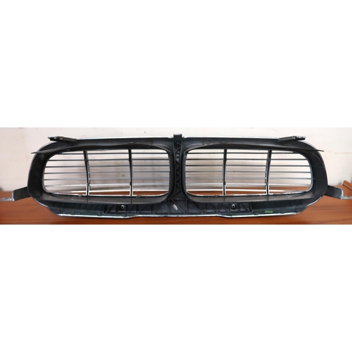 116 - A 20th century chrome coloured Jaguar radiator grill, 23cm high x 87cm wide