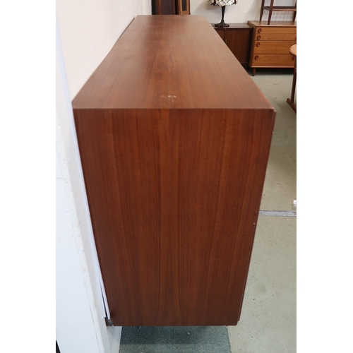 117 - A mid 20th century Danish teak E. W. Bach for Sejling Skabe sideboard with three slide doors conceal... 