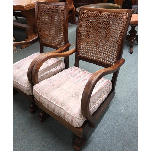 118 - A pair of early 20th century mahogany framed bergere armchairs with rocking bases, 86cm high x 56cm ... 