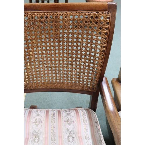 118 - A pair of early 20th century mahogany framed bergere armchairs with rocking bases, 86cm high x 56cm ... 