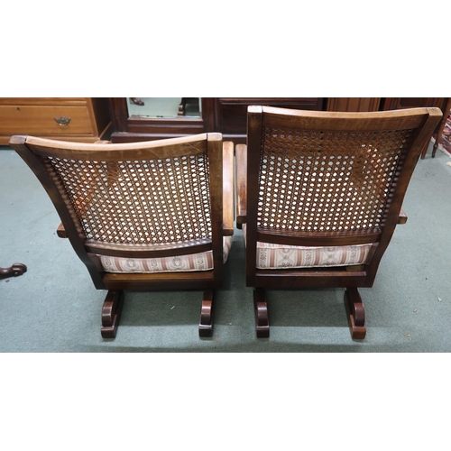 118 - A pair of early 20th century mahogany framed bergere armchairs with rocking bases, 86cm high x 56cm ... 