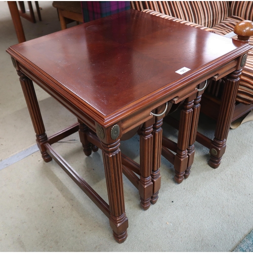 123 - A 20th century mahogany lamp table with two nesting folding tables, 53cm high x 56cm wide x 56cm dee... 