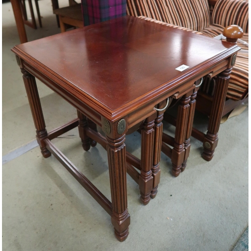 123 - A 20th century mahogany lamp table with two nesting folding tables, 53cm high x 56cm wide x 56cm dee... 