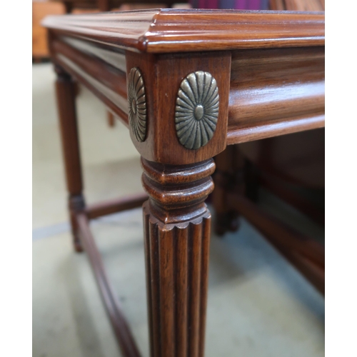 123 - A 20th century mahogany lamp table with two nesting folding tables, 53cm high x 56cm wide x 56cm dee... 