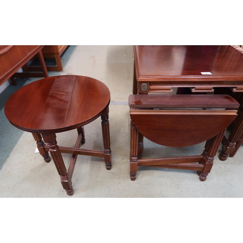 123 - A 20th century mahogany lamp table with two nesting folding tables, 53cm high x 56cm wide x 56cm dee... 