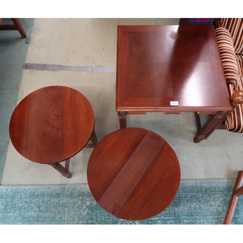 123 - A 20th century mahogany lamp table with two nesting folding tables, 53cm high x 56cm wide x 56cm dee... 