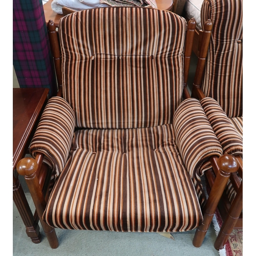 124 - A mid 20th century teak framed Guy Rogers three piece suite consisting three seater settee, 83cm hig... 